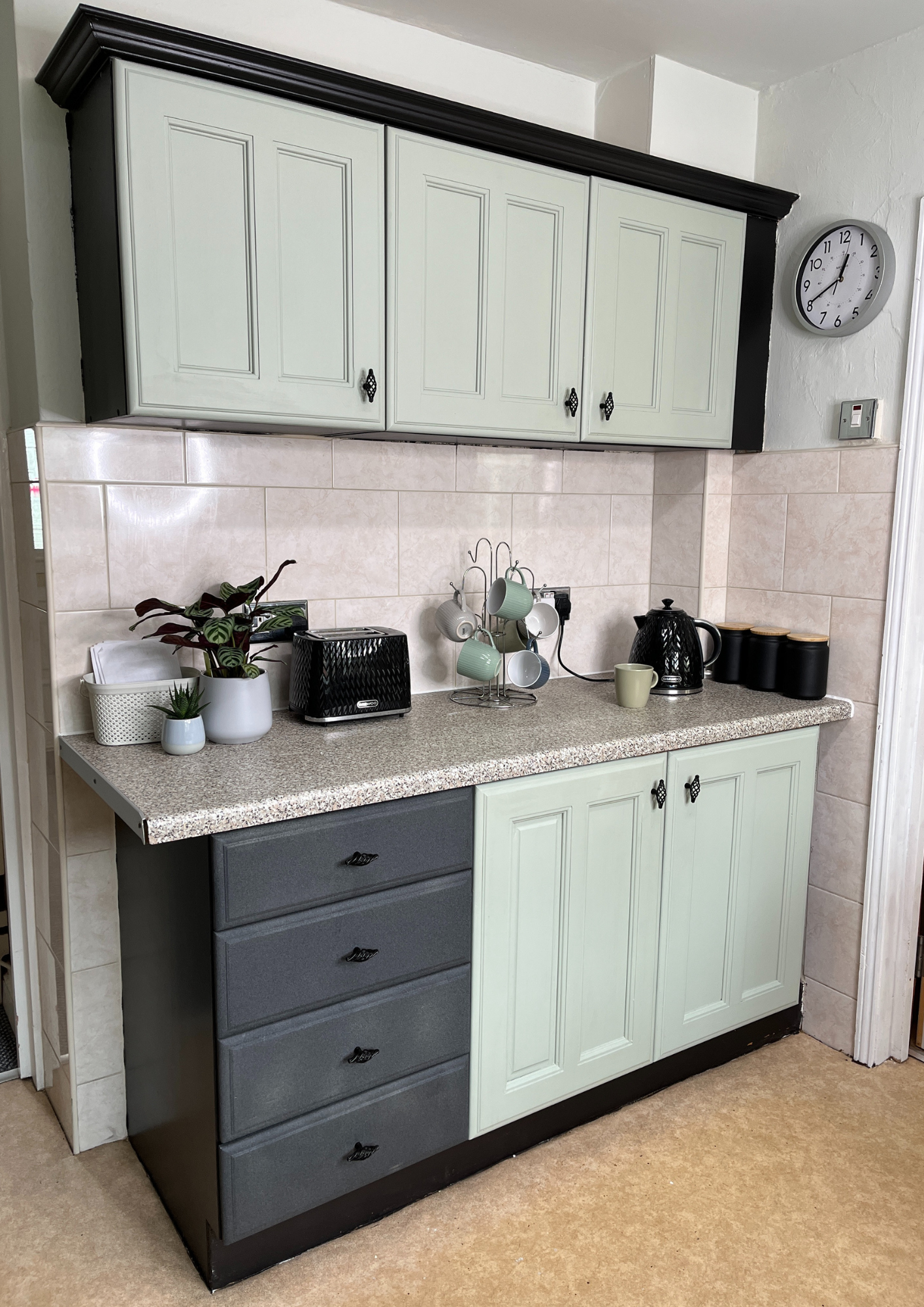 View of one of the kitchenette spaces. A modern looking kitchen with a sink and worktop.